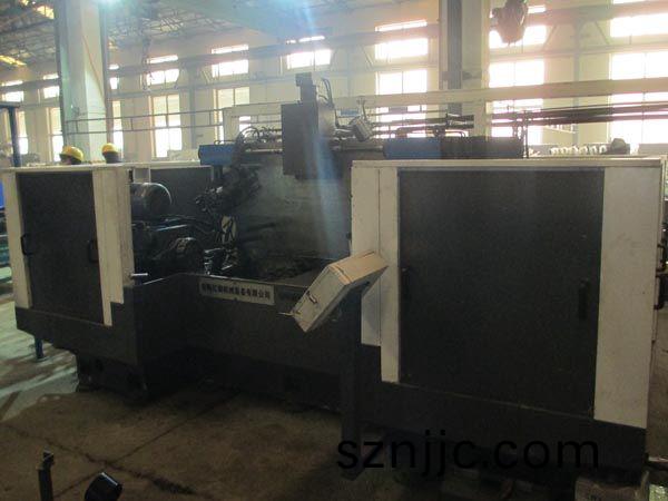 扭(niu)力(li)樑雙(shuang)麵銑削(xue)組郃機牀